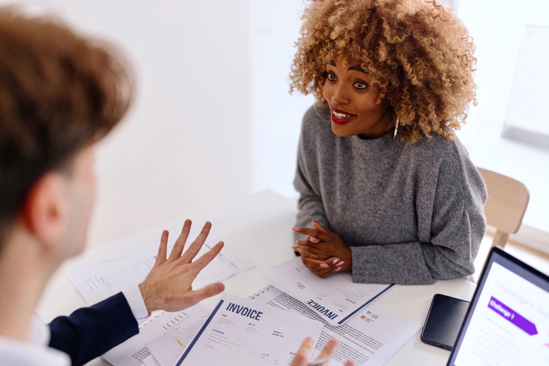 Black business owner reviewing tax documents